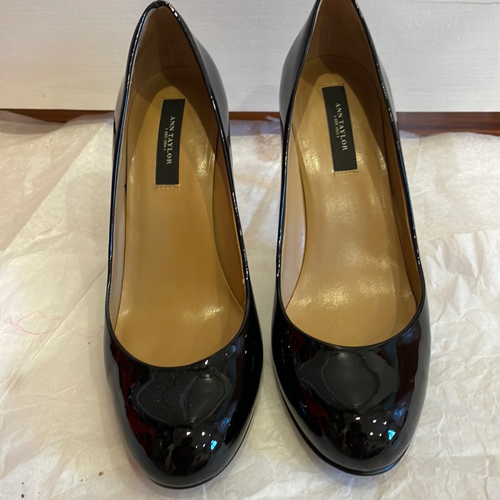 Black patent round toe pumps